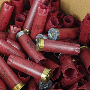 Box of empty 12 gauge shotgun shells / hulls, maroon